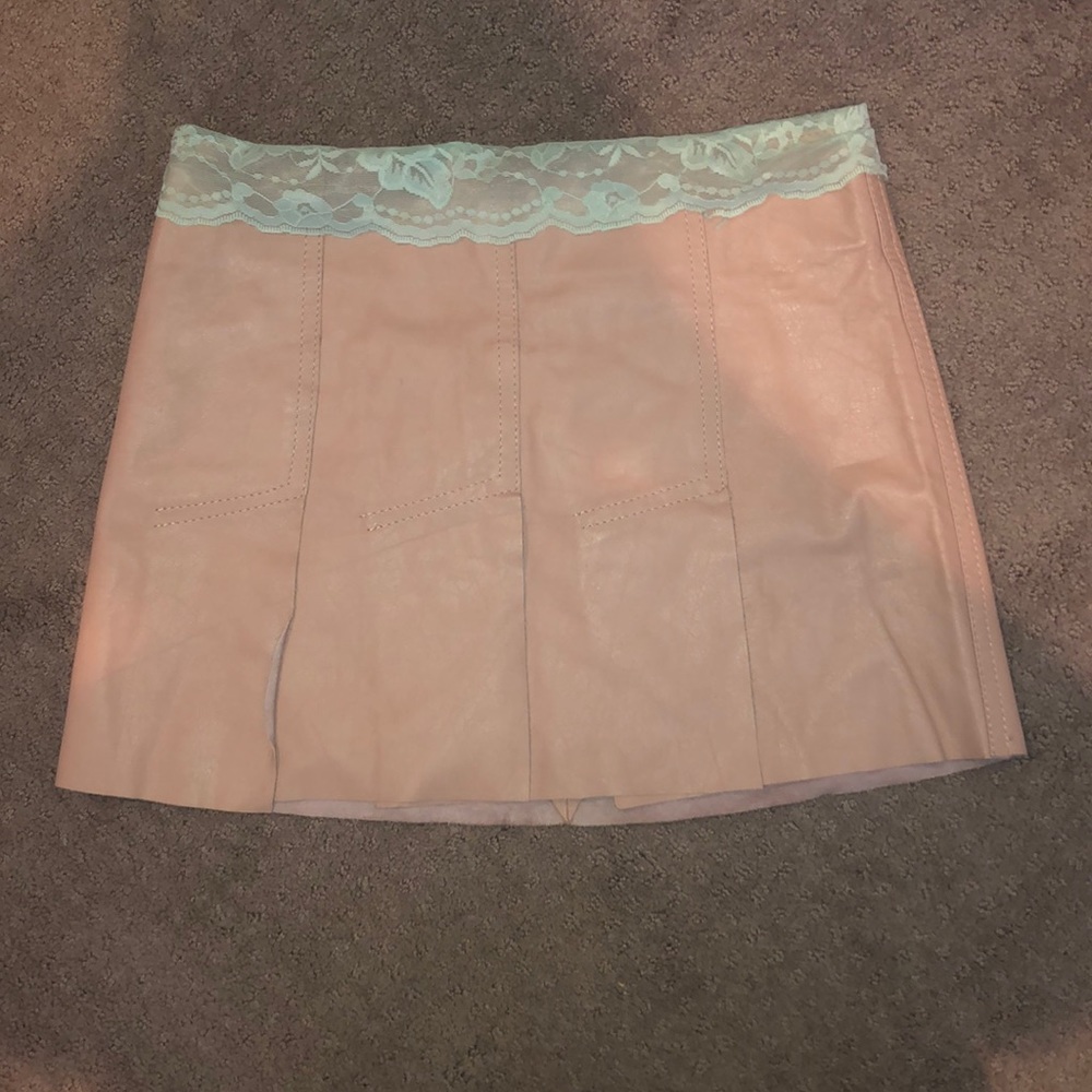Leather and lace mini skirt